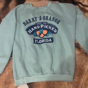 Barry’s Orange Sweater